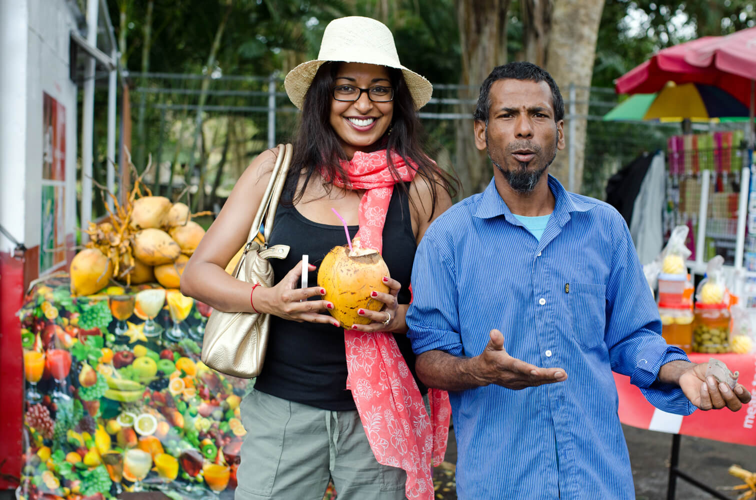 Writer with coconut vendor, Pamplemousse Gardensjpg